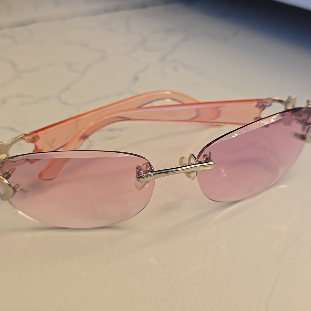 Designer-Style Pink Rimless Sunglasses with Gold Accents